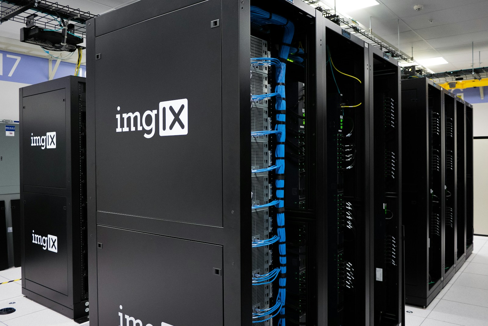 Data center hallway with illuminated servers